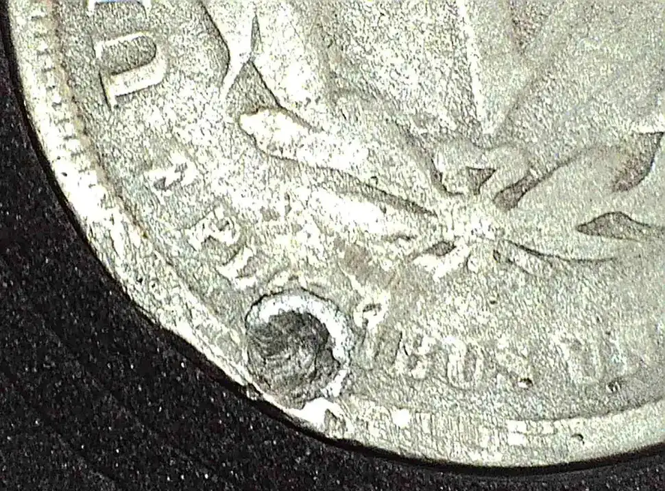 What-Is-That-Weird-Small-Cud-Thing-On-The-Rim-Of-This-1883-No-Cents-Nickel?
